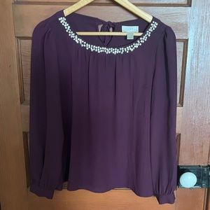 Purple Loft blouse with rhinestones detailing and tied back. Size small.